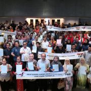 Abang Johari (centre) at a presentation of land titles to landowners in Sarawak